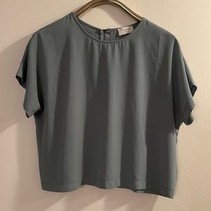 Everly brand shirt. Size large but fits smaller.